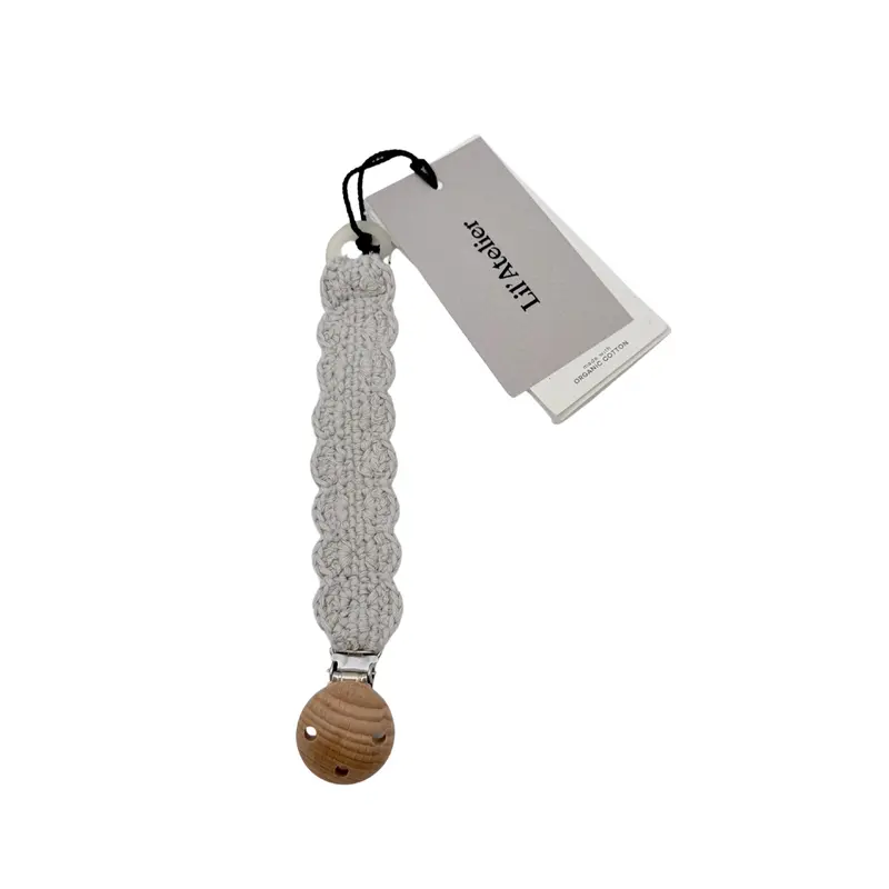 Attache-sucette bébé en crochet beige et bois