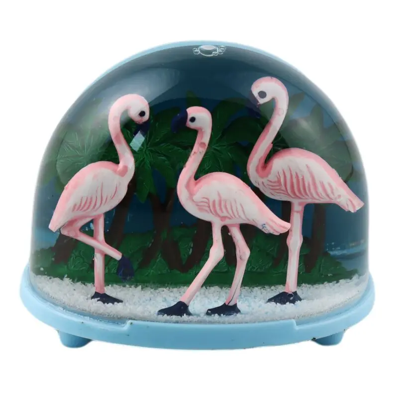 Boule à neige flamant rose