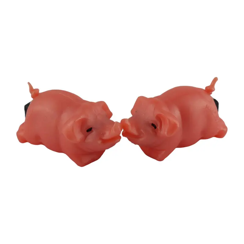 Duo de cochons aimantés s’embrassant style rétro
