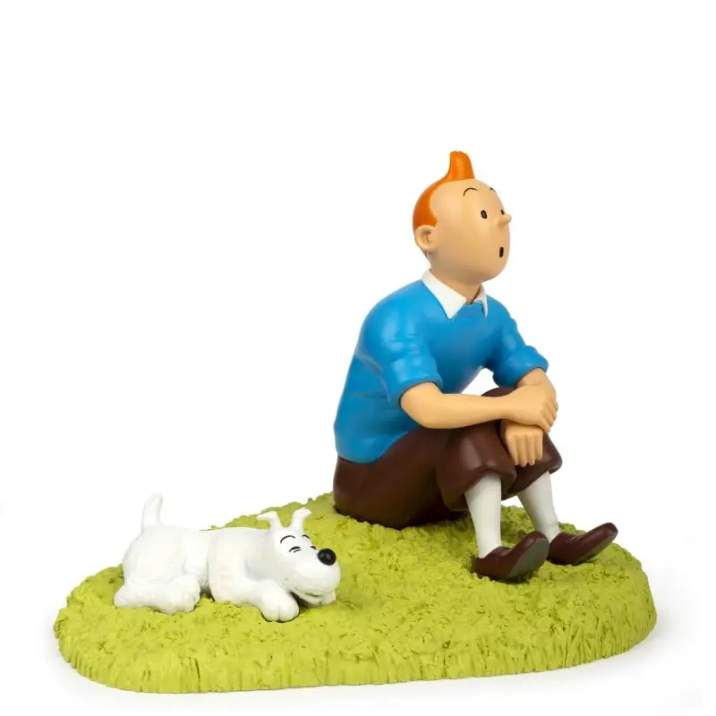 Figurine résine Tintin & Milou assis dans l'herbe - L’Île Noire