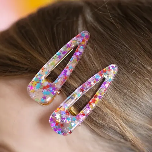Lot de 2 barrettes en résine à étoiles